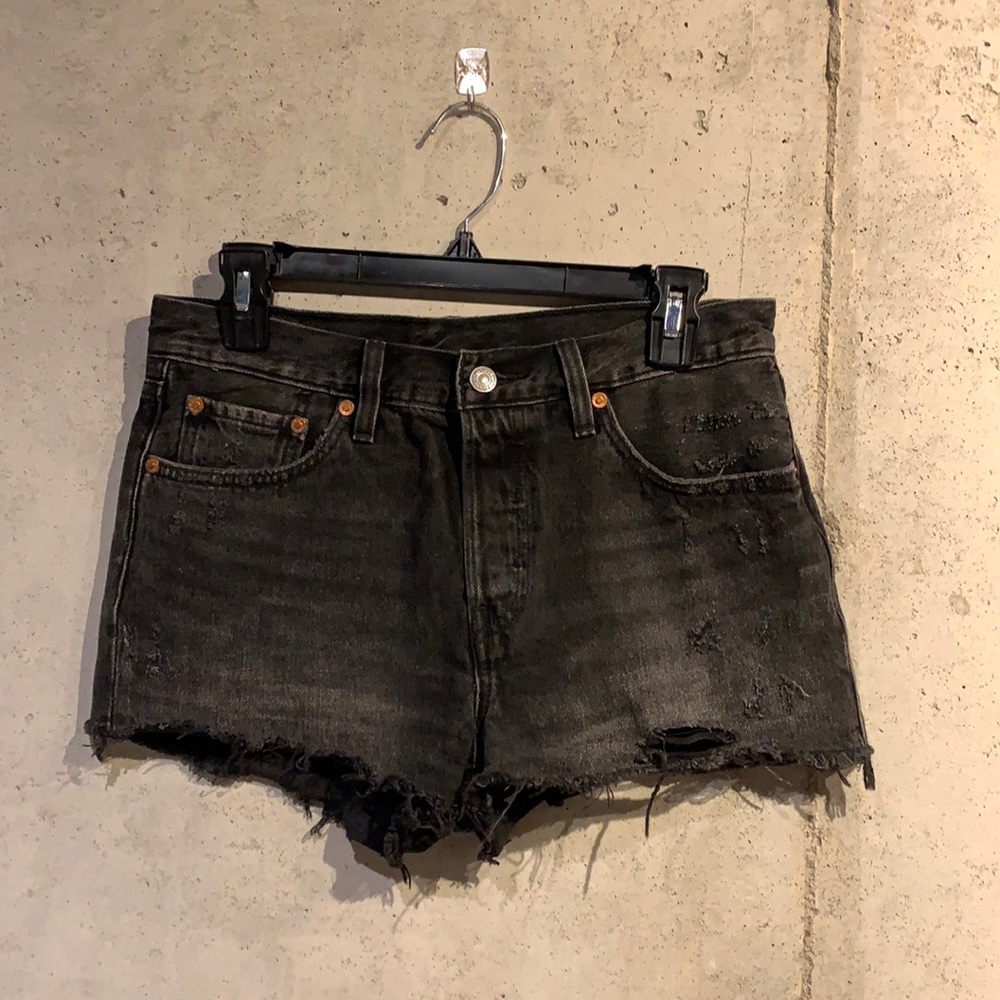 Women’s black distressed Levi’s shorts